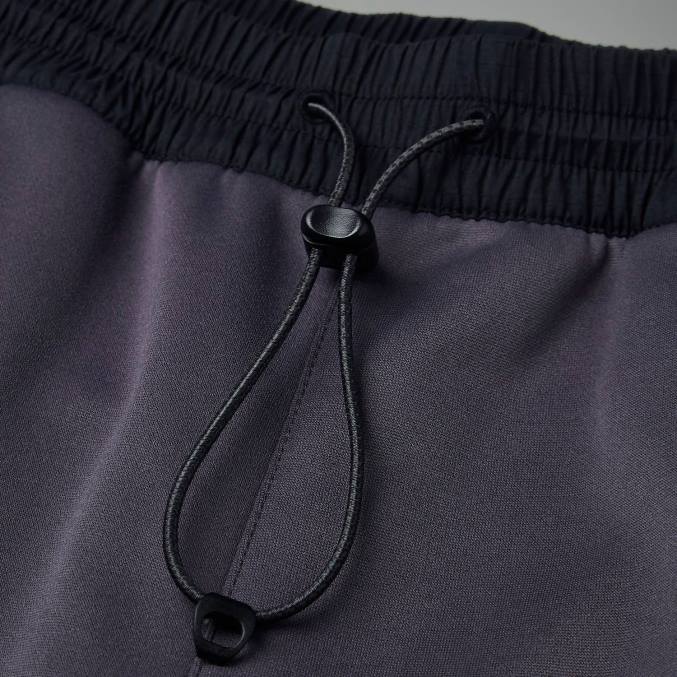 Berghaus moški reacon hlače 6JTH239 oblačila črtasto siva/črna